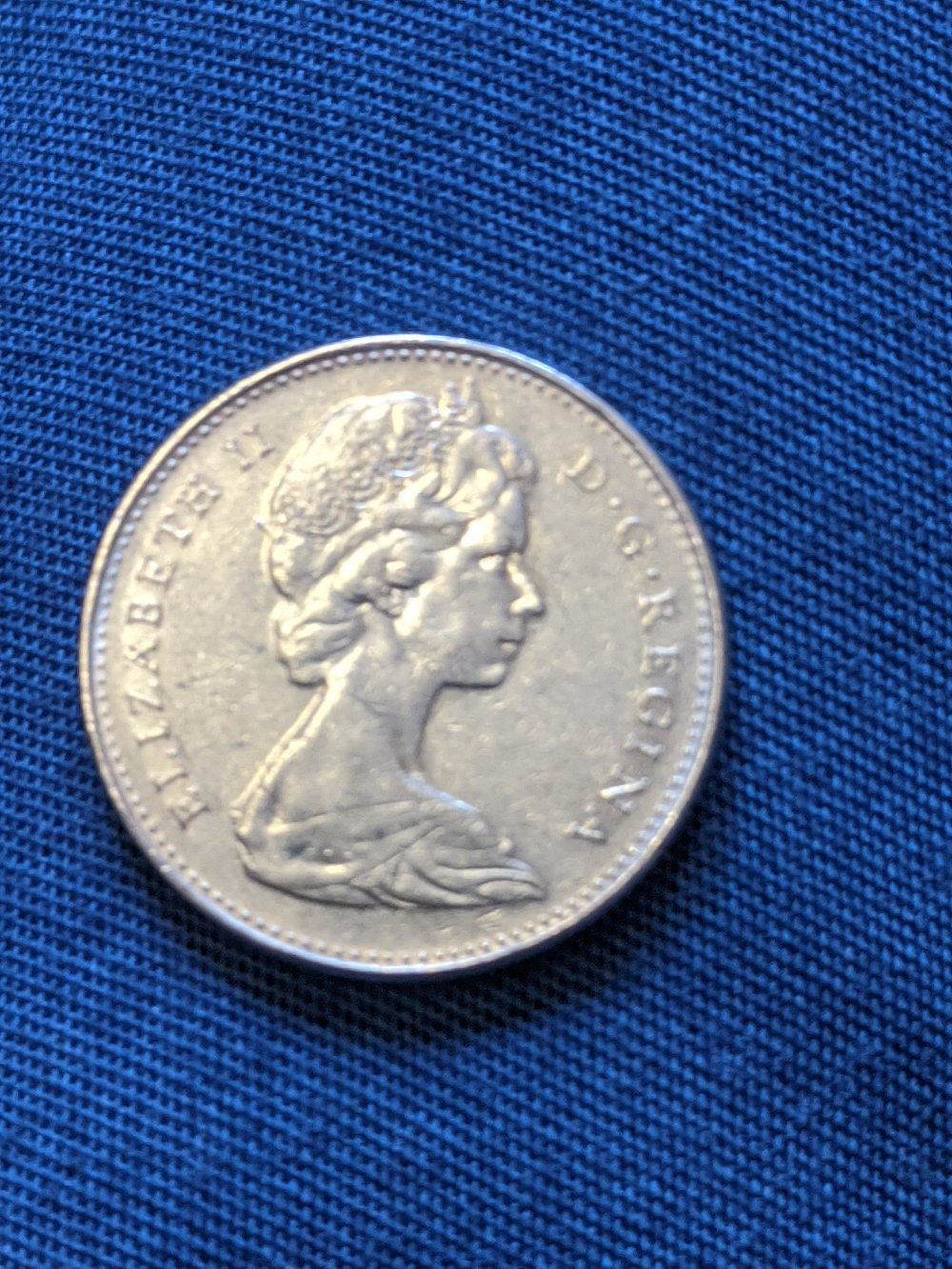 Pretty-Sure-I-Found-A-1965-High-Relief-5-Cent.