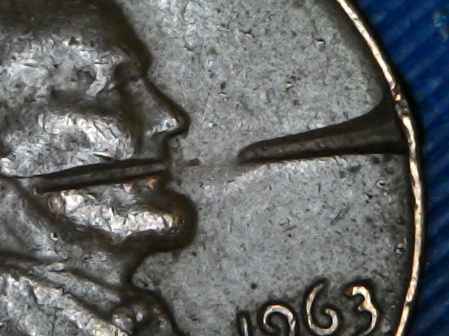 1963-Penny-Struck-Through-Object?