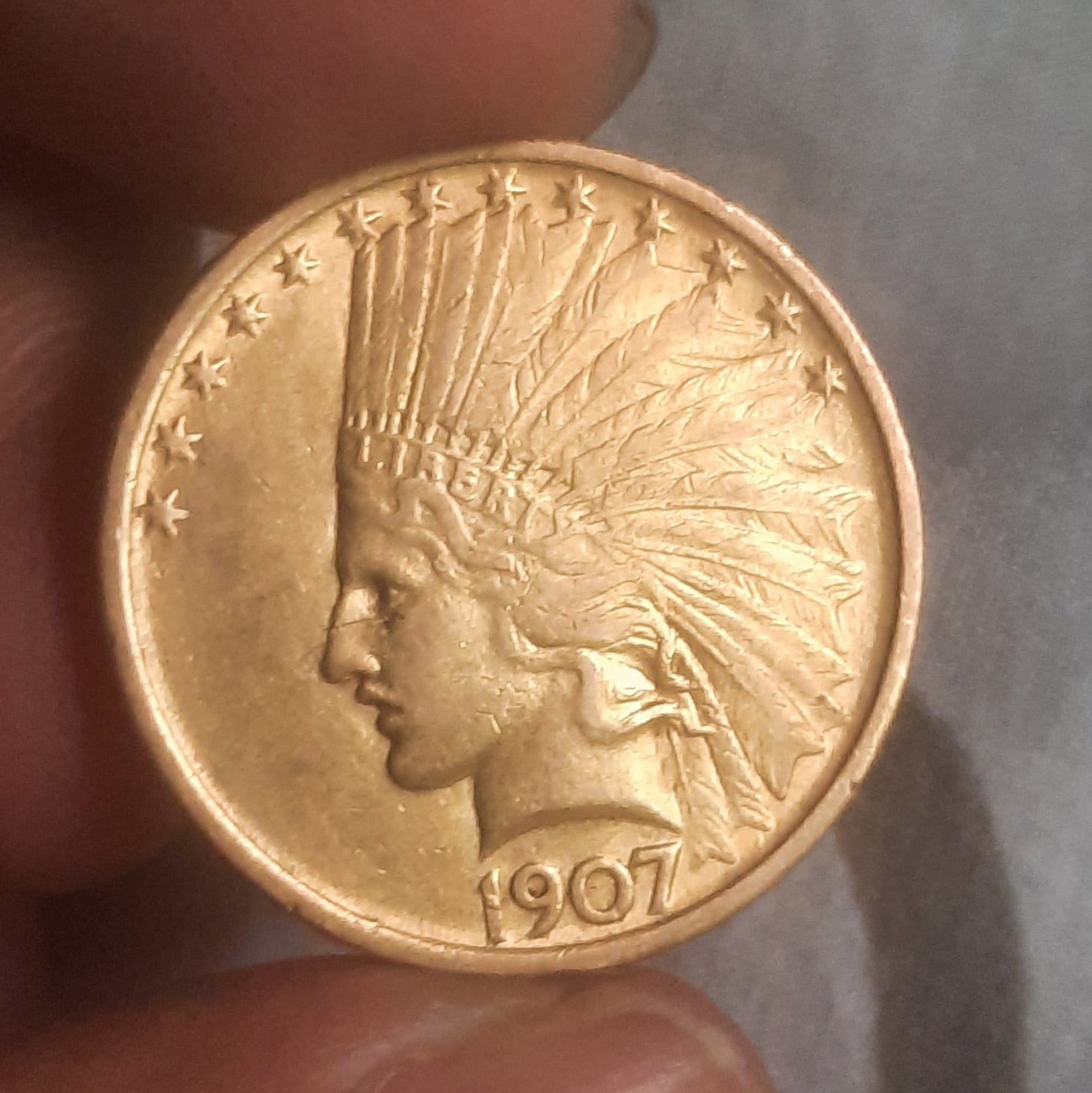 Help-On-1907-$10-Indian-Gold