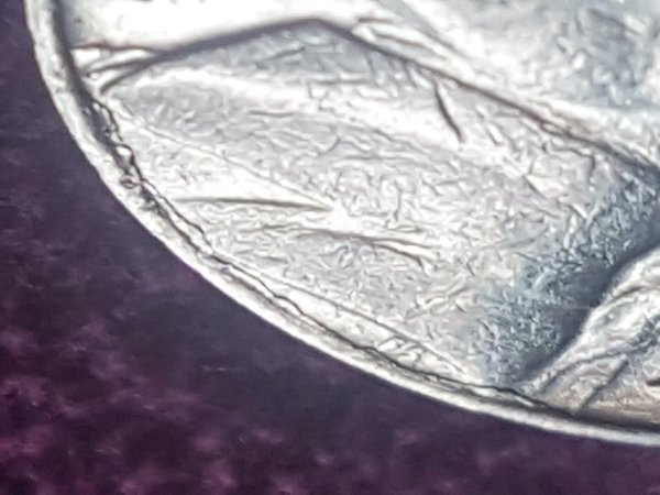 1974-D-Nickel-Cracked-On-The-Inside-Edges