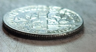 1985-D-Mint-Dime-.-Is-This-A-Weak-Strike-Error.-If-Not-Can-Anyone-Tell-What-This-Is?