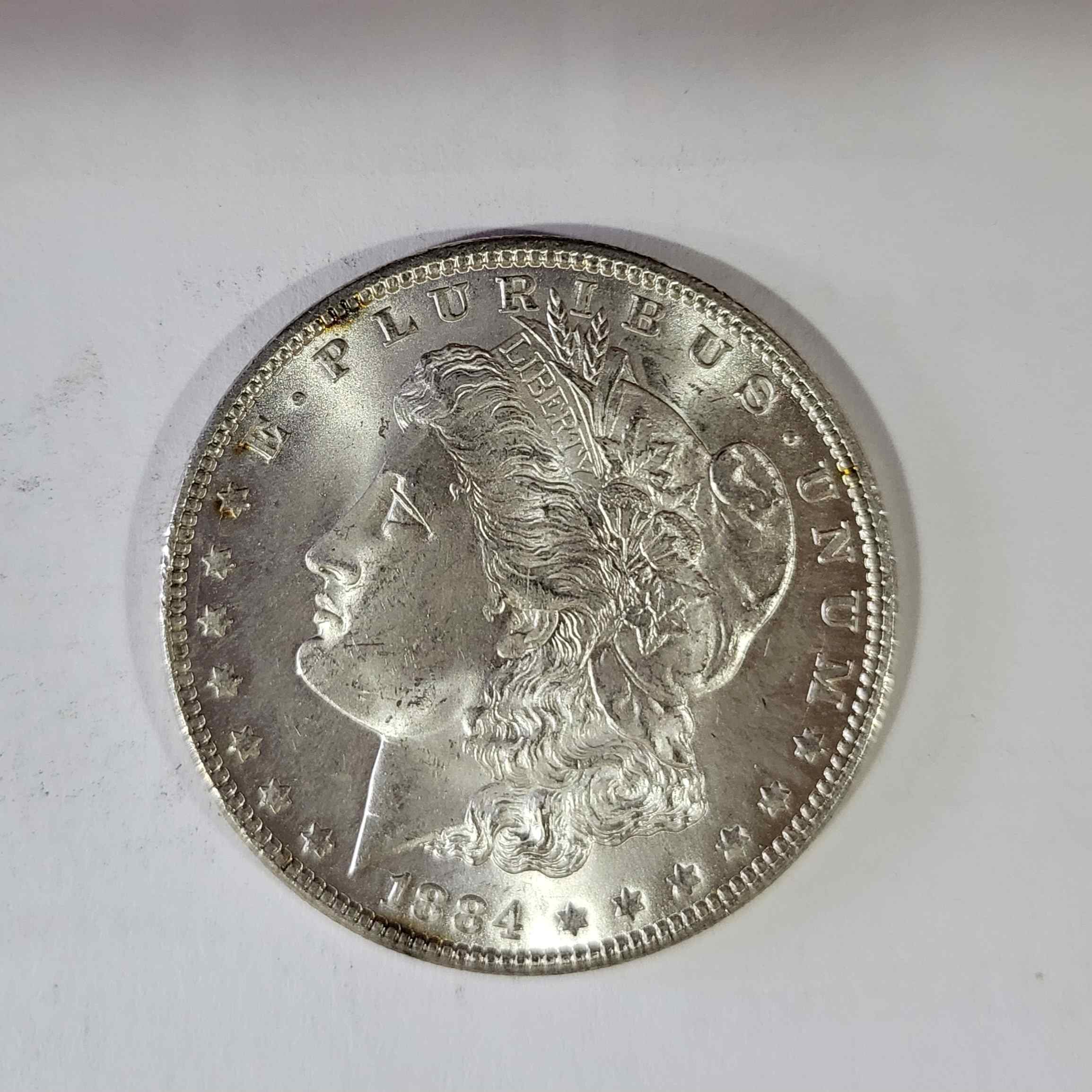1928-S-Peace-Dollar-And-1884-Morgan-Grading