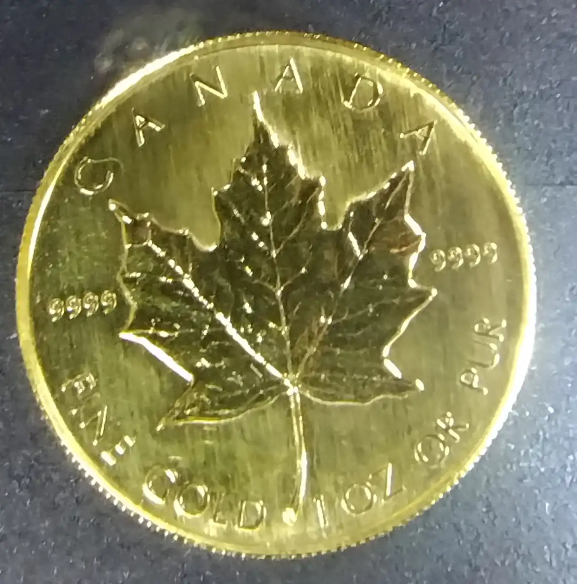 Value-Of-1984-And-1985-$50-Canadian-Maple-Leaf-Gold-Coins-Featuring-Queen-Elizabeth-II