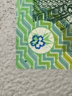 PMD-Stamp-On-$100-Banknote?
