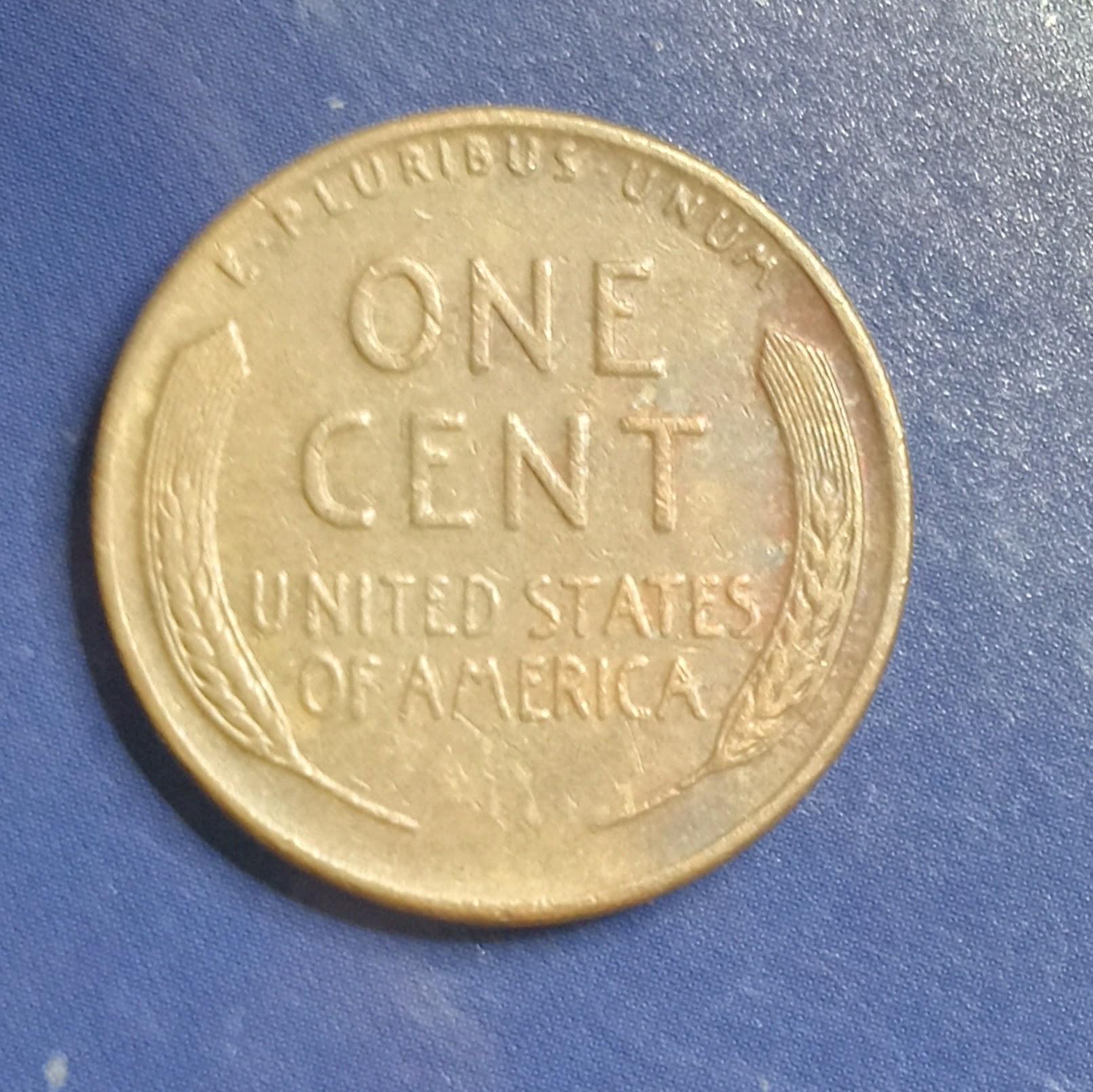 Is-This-A-Dot-Between-We-And-Trust-On-A-1951-D-Penny-?