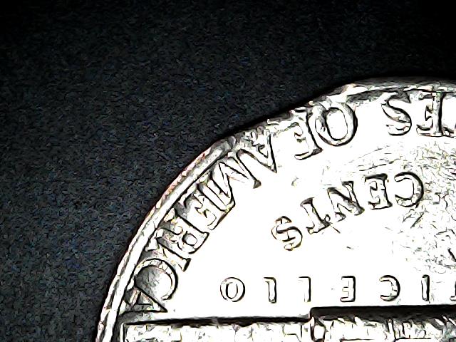 Four-Clipped-Planchets-Found-In-Bank-Rolls