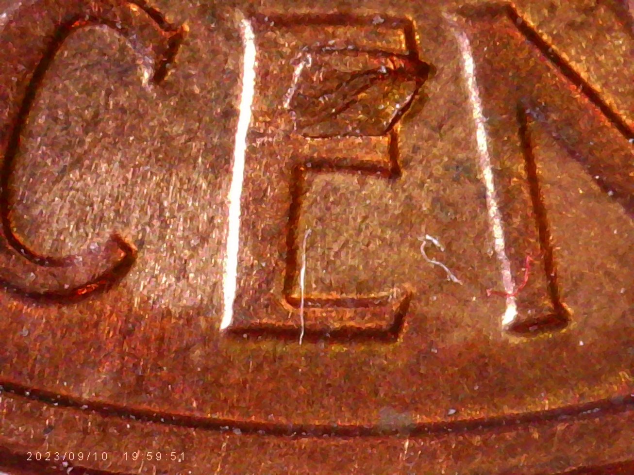1959-D-LMC.-Is-This-Die-Chip?-Or-From-Another-Coin?-Looks-Like-There-Is-Letters--On-It.-Thanks-Bent.