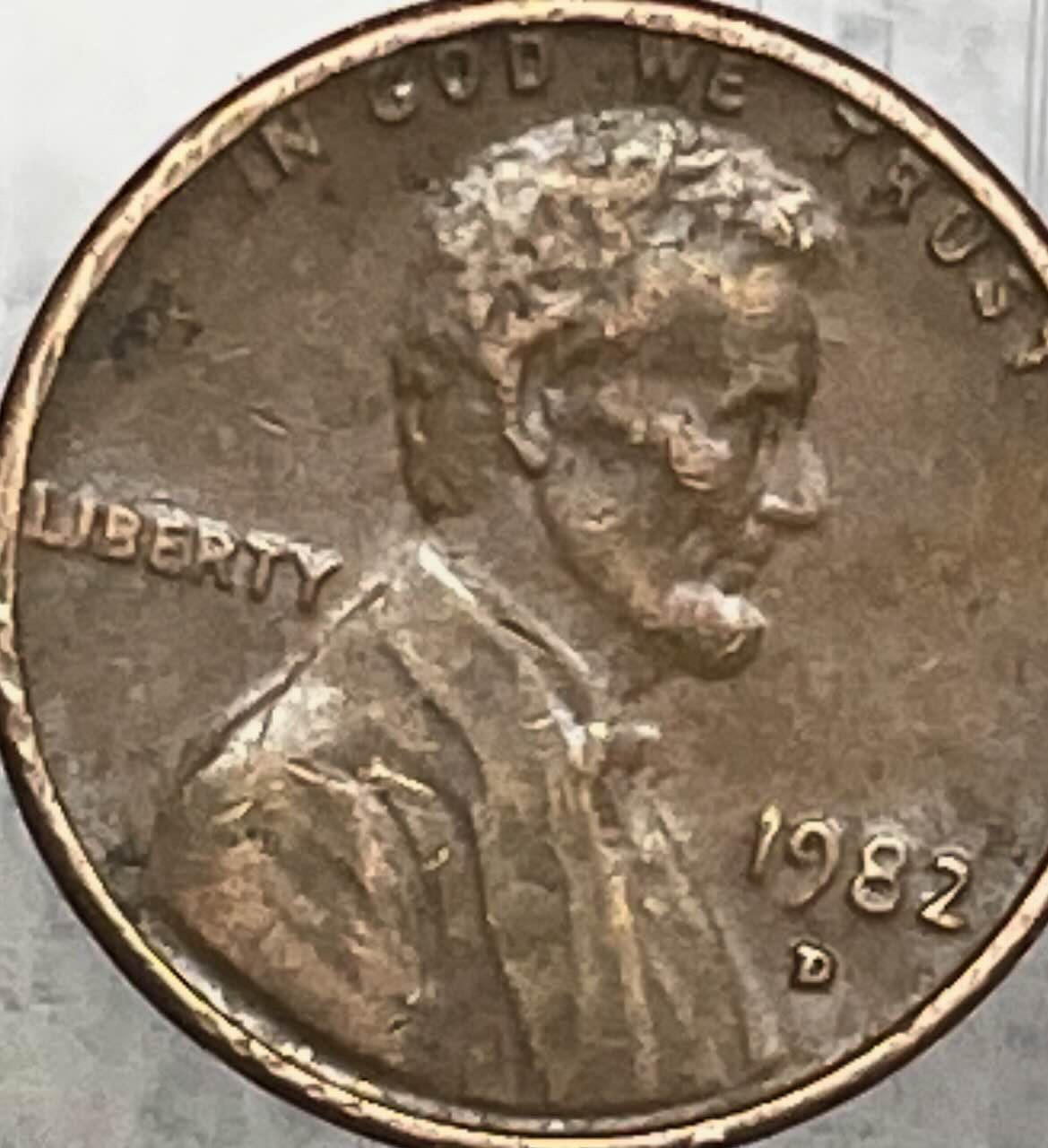 1982-D-Cent:-Best-Doubling-And-A-Body-Lying-On-Lincoln's-Steps