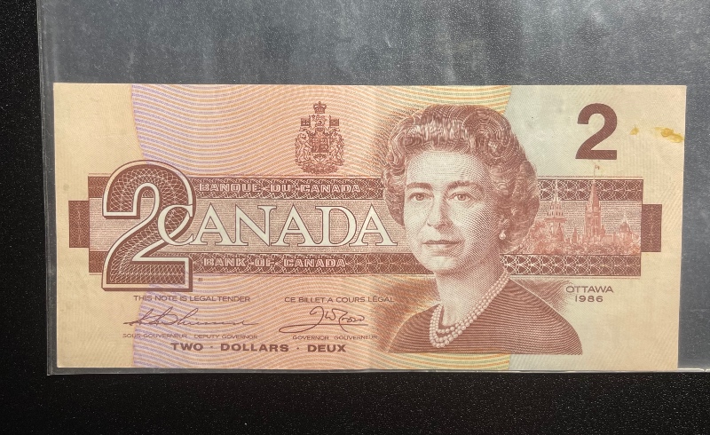 One-Stack-Of-1986-Canada--2-Dollar-Bills-And-One-Is-Auu,-Please-Help?