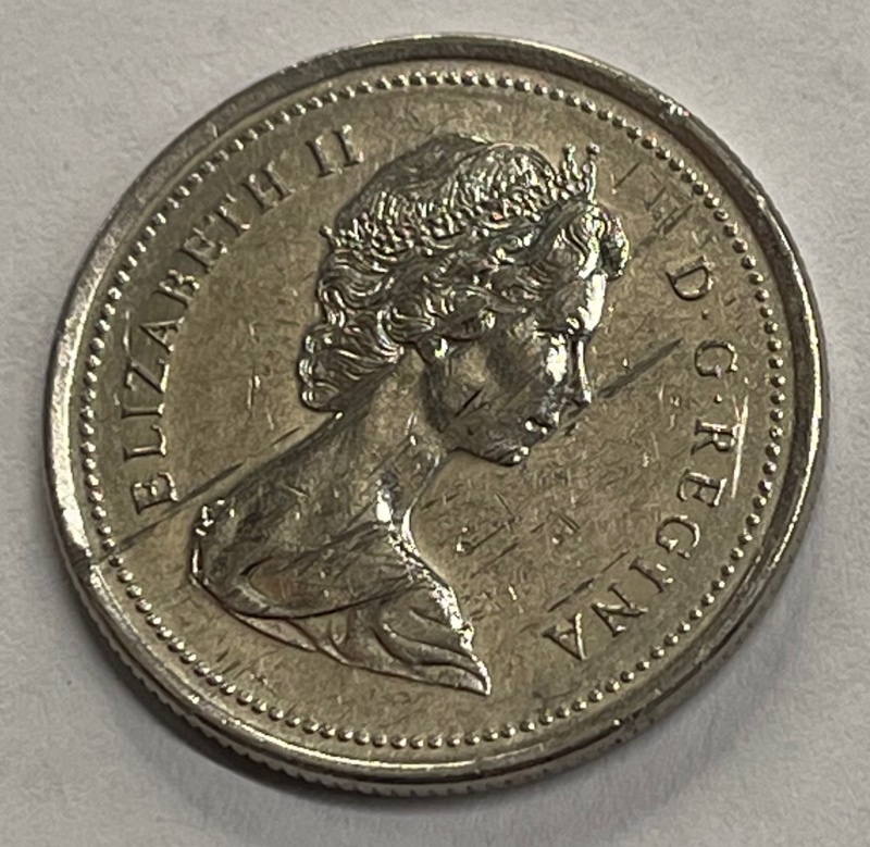 Need-Help-Identifying-1973-Canadian-Quarter---Sm-Or-Large?