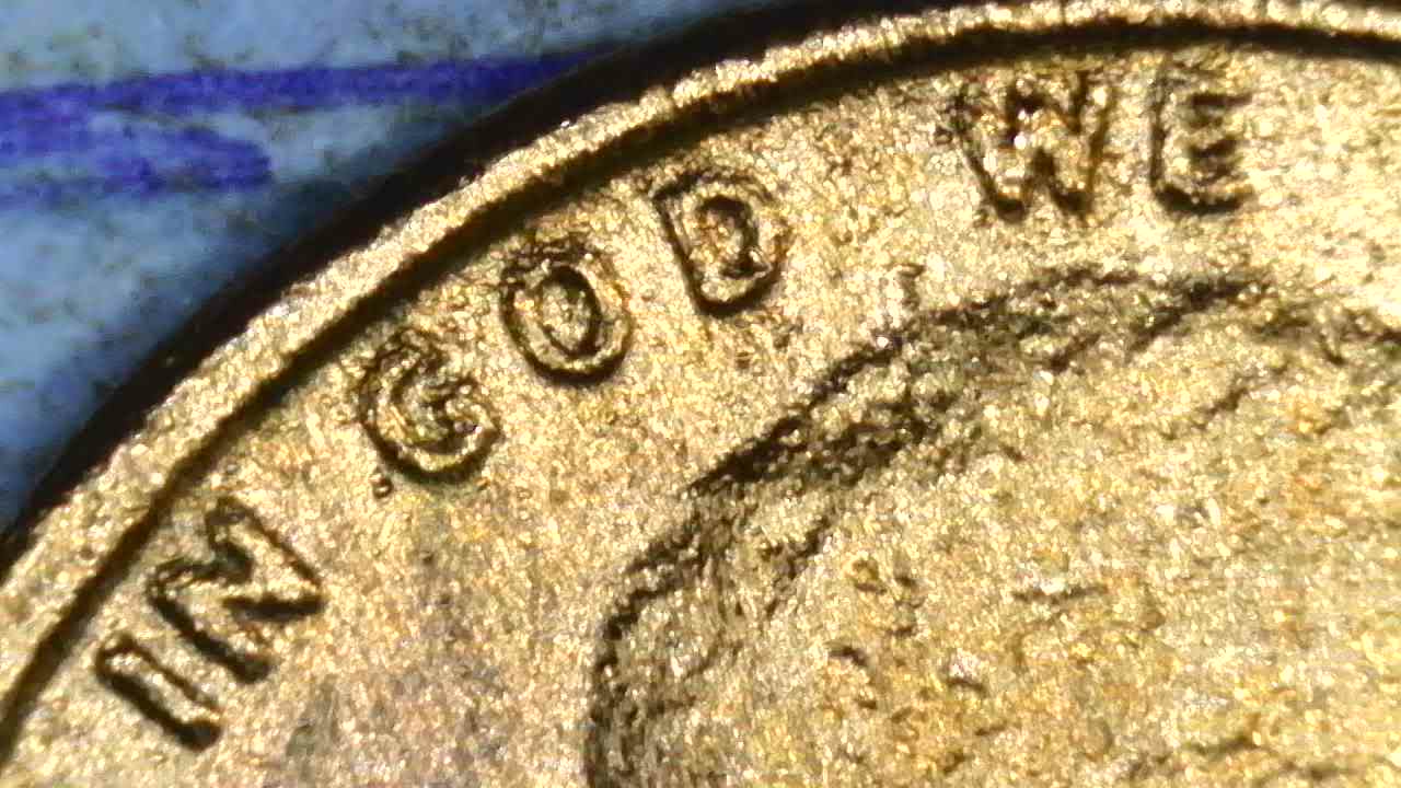 1976-D-Cent-What-Have-I-Found?--Bleb,-Occluded-Gas-Bubbles,-Flow-Lines,-Parallel-Lines?