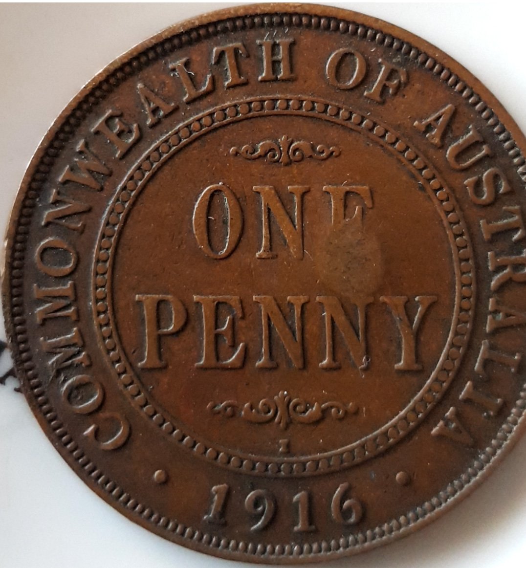 1916-Penny-King-With-A-Hole-In-His-Face.