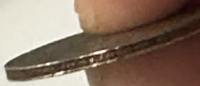 1967-Dime-That-Weighs-2.00-Grams-And-Looking-At-Reeded-Edge-You-Can-See-The-Layers-