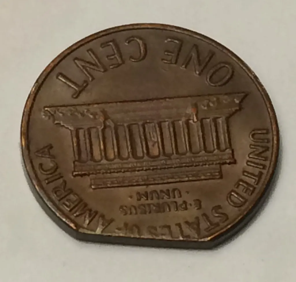1969-Lincoln-Memorial-Cent---Clipped-Planchet-Or-PMD?