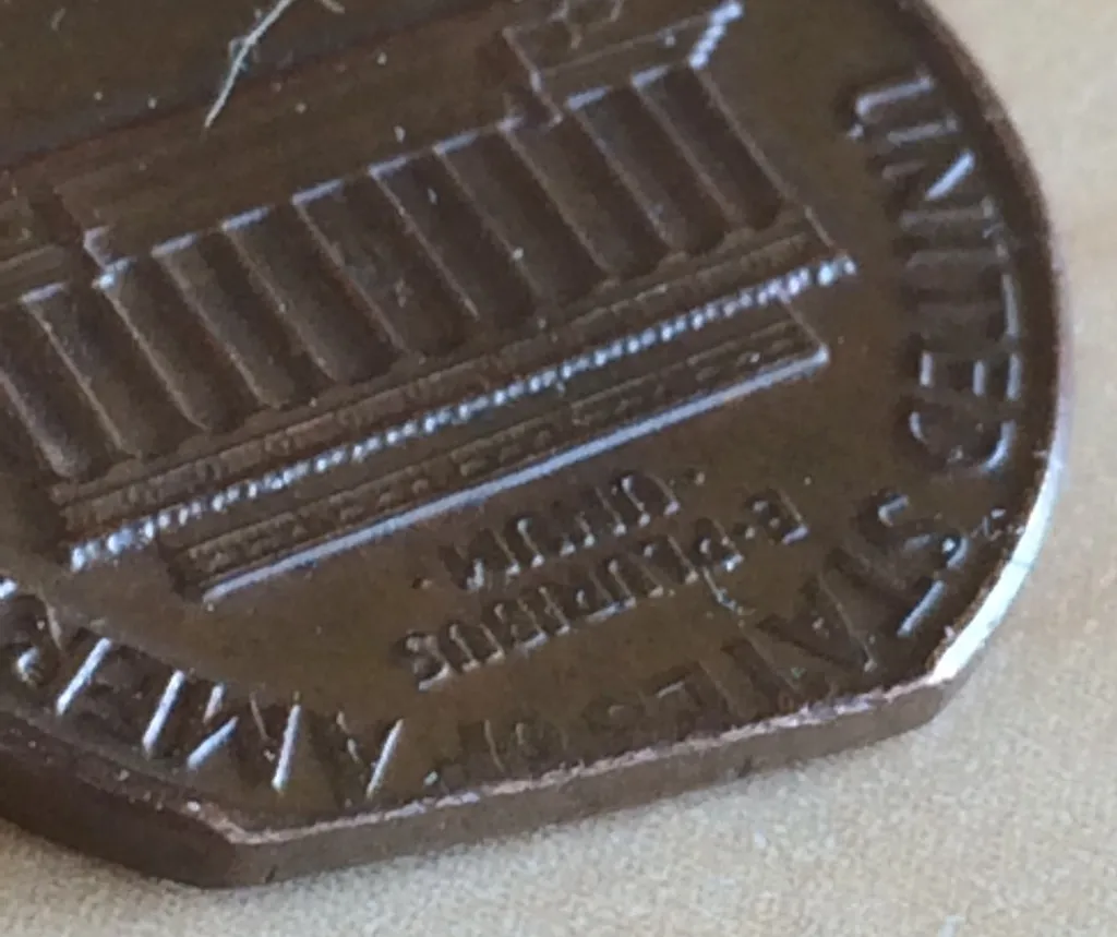 1969-Lincoln-Memorial-Cent---Clipped-Planchet-Or-PMD?