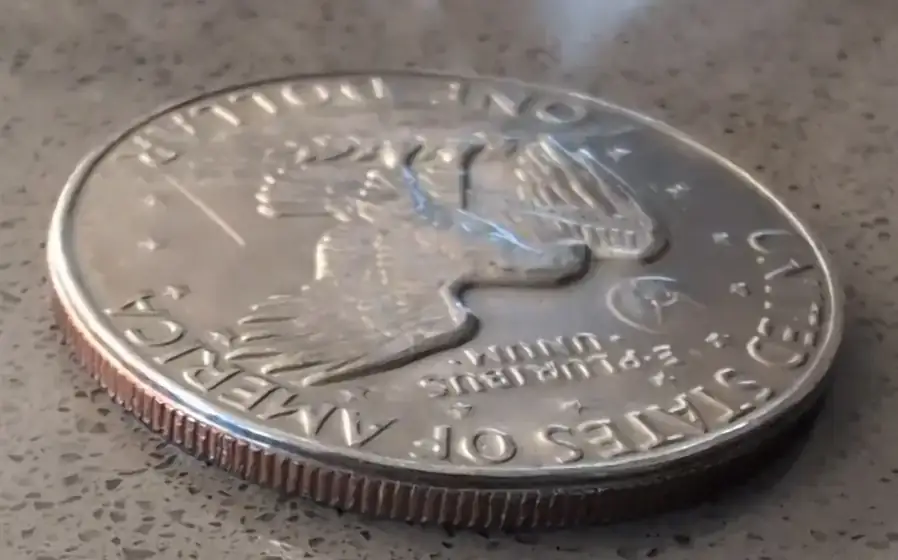1977-Eisenhower-Dollar-With-Railroad-Rim