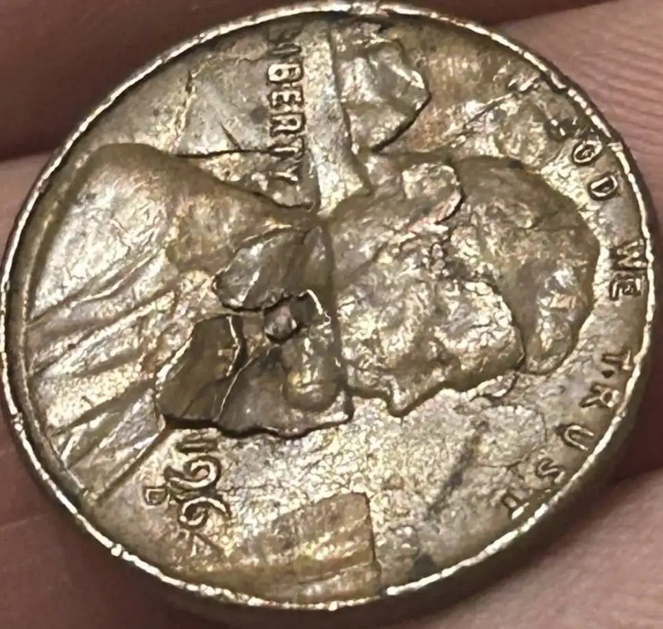 1964-D-Lincoln-Memorial-Cent-With-Multiple-Retained-Laminations