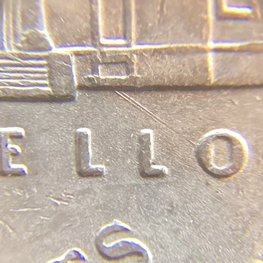 2013-P-Nickel-With-Feeder-Finger-Damage.
