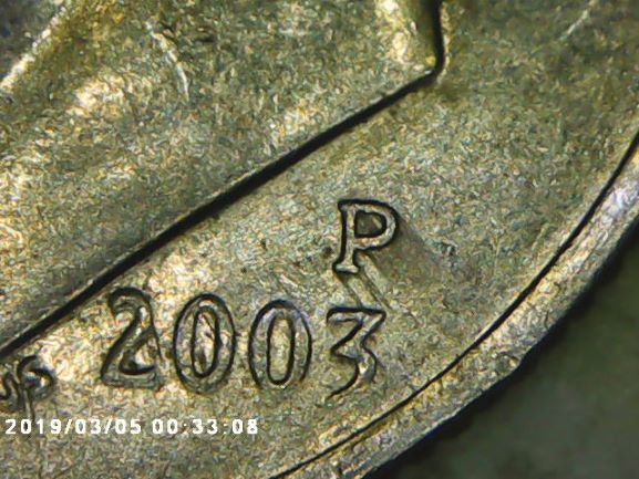 What-Is-This-Called-When-It-Looks-Like-Ink-Streaks?-2003-P-Dime
