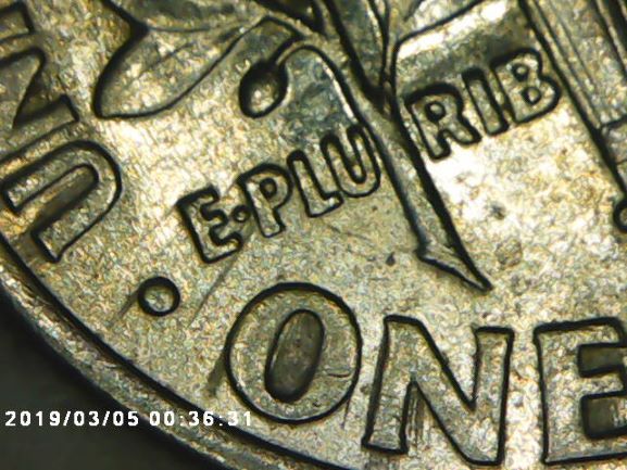 What-Is-This-Called-When-It-Looks-Like-Ink-Streaks?-2003-P-Dime