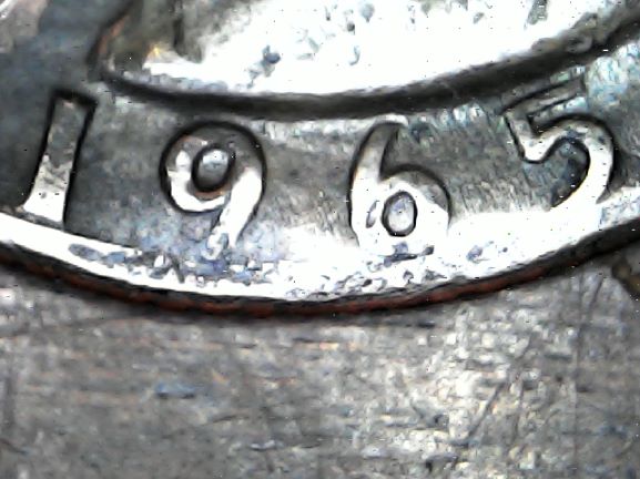 1965-Quarter-Dollar-...dark-With-Something-Inside-The-Coin?