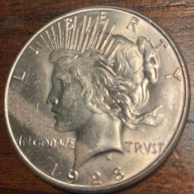 1928-S-Peace-Streak-On-Obverse