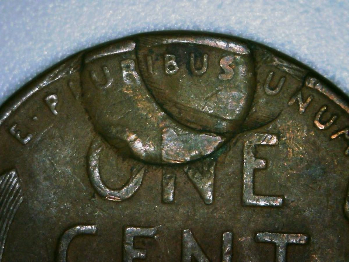 1937-Wheat-Penny-Die-Error-Or-Damage-After-Minting?