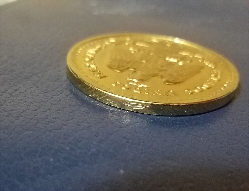 Does-This-Copy-Coin-Contain-Real-Gold?