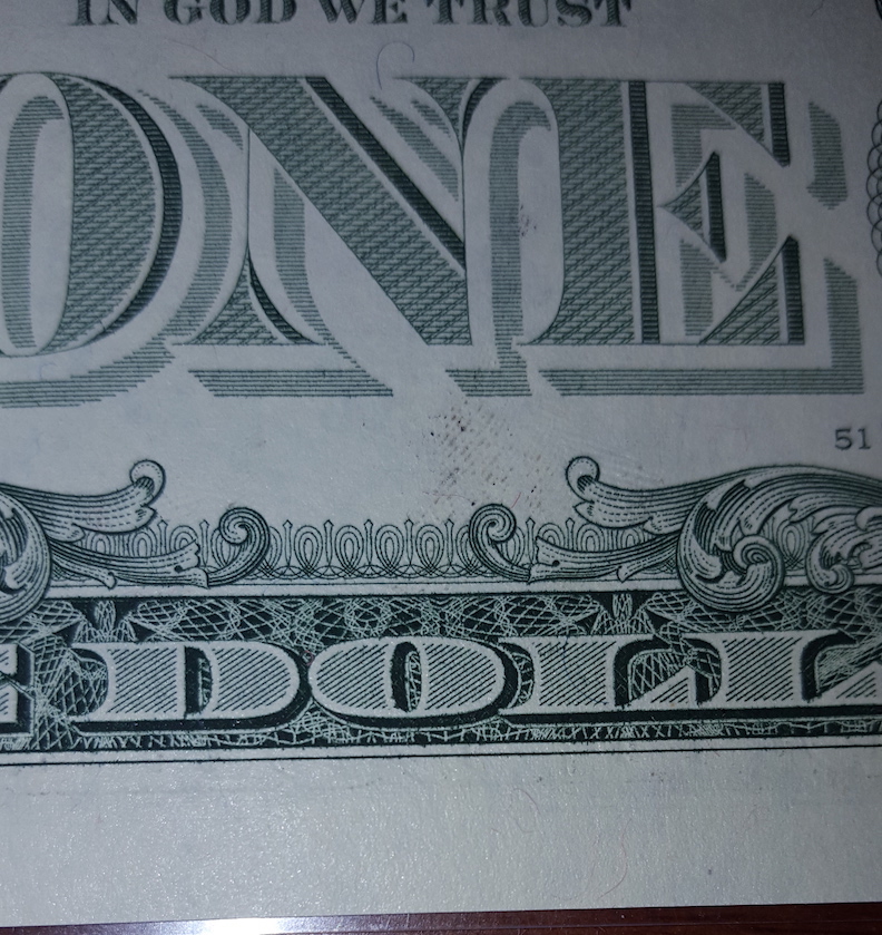 Fingerprint-Ink-Smear-On-A-Dollar-Bill?