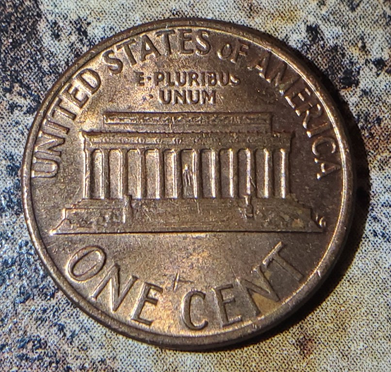 Grease-Or-Strike-Error?-1979-D-Penny