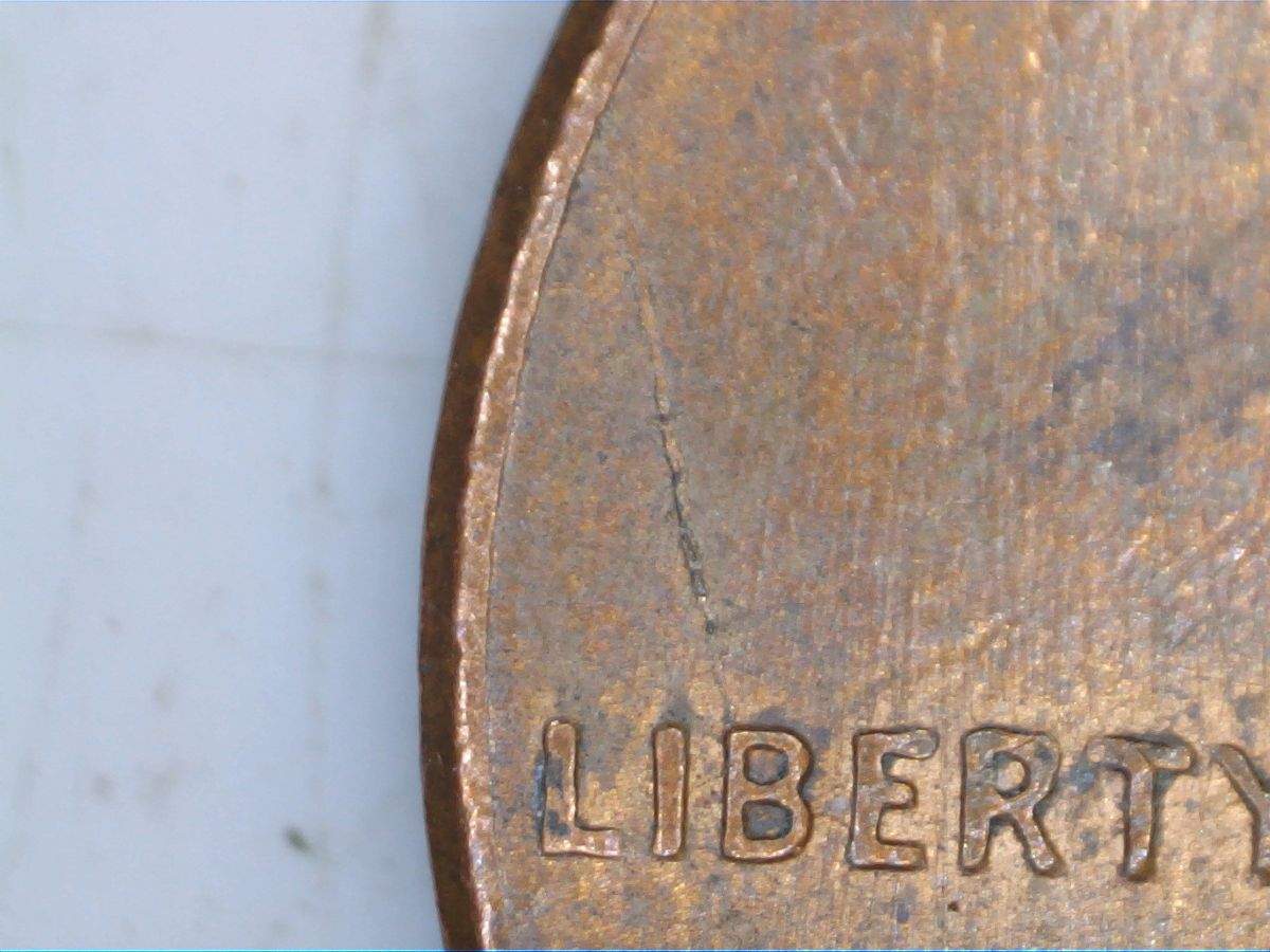 Post-A-Coin-Or-Medal-With-A-Die-Crack!