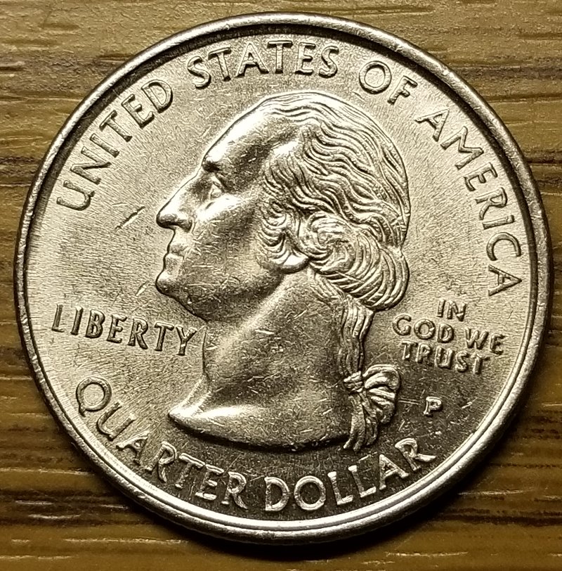 1999-Delaware-State-Quarter.-What-Is-Going-On-With-This-Letters?