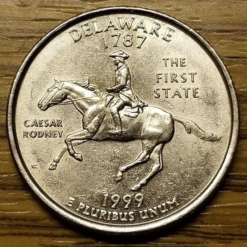 1999-Delaware-State-Quarter.-What-Is-Going-On-With-This-Letters?