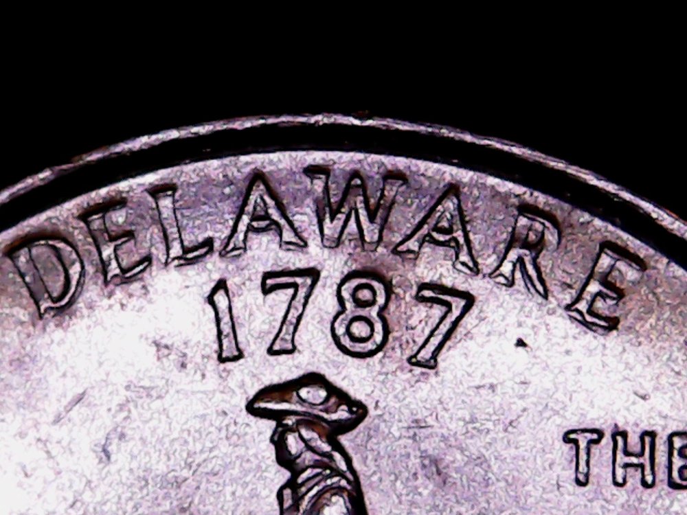 1999-Delaware-State-Quarter.-What-Is-Going-On-With-This-Letters?