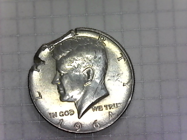 1964-Kennedy-Half.-Clipped-Planchet-Or-PSD?