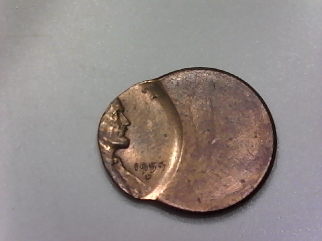 Three-Lincoln-Cents-Struck-Off-Center-And-One-?-Jewelry-Piece?