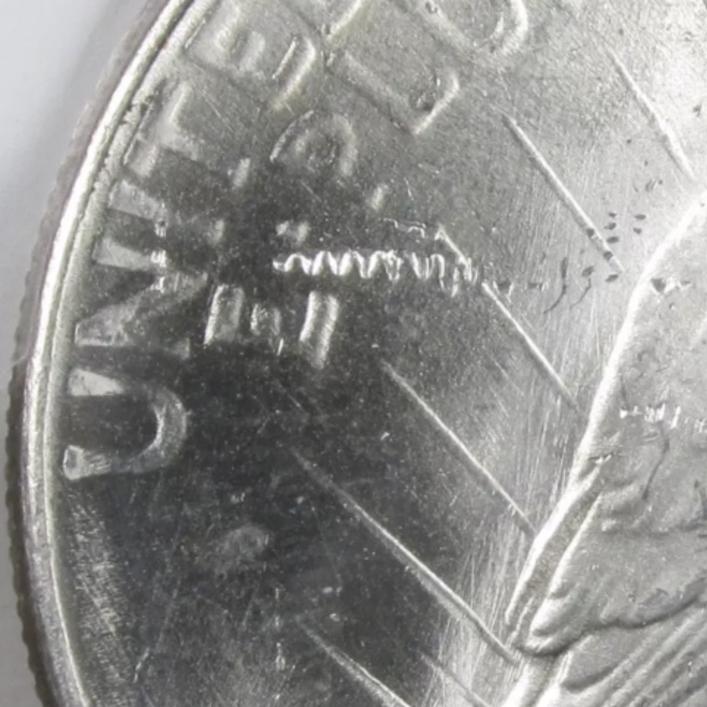 1925-Peace-Dollar.-Origin-Of-Squiggle-Mark?