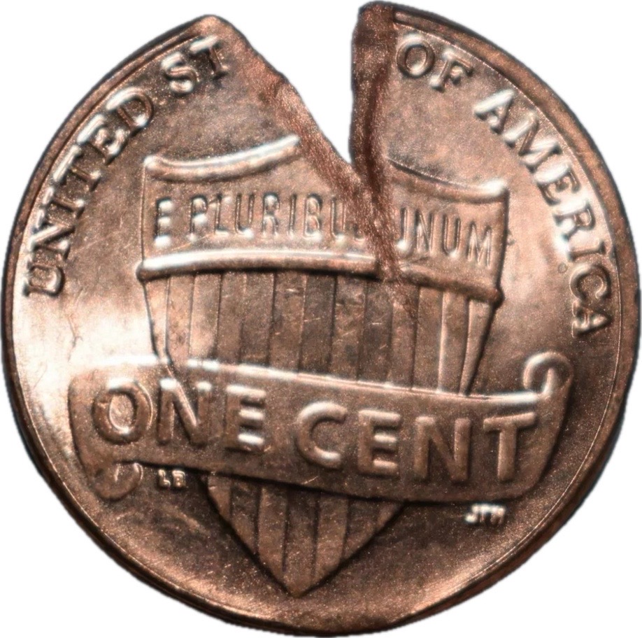 2022-D-Lincoln-Shield-Cent-Fissure,-Blow-Hole,-Or-Tinsnips?