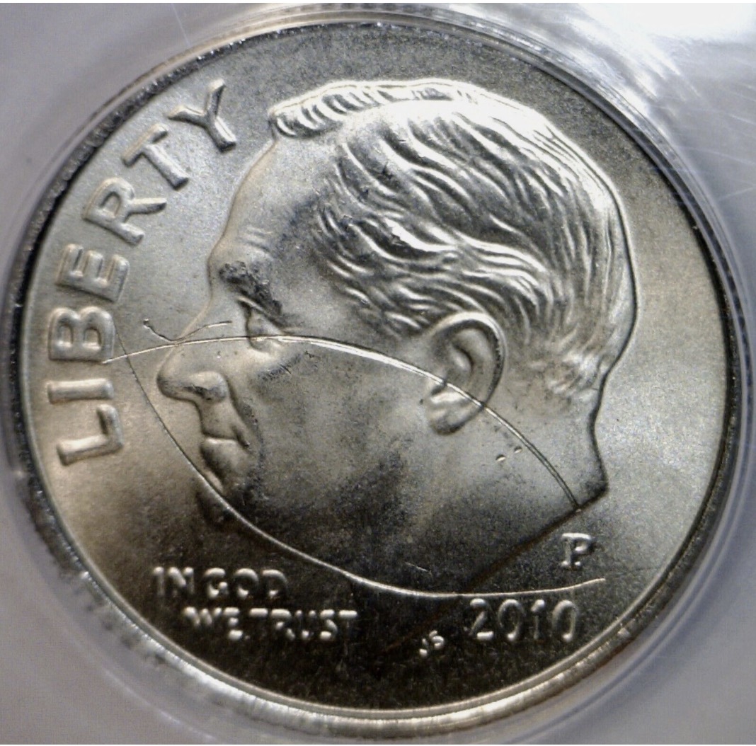 Help-With-1979-P-Lincoln-Cent-Struck-Through,-Planchet-Error,-Or?-Off-Center