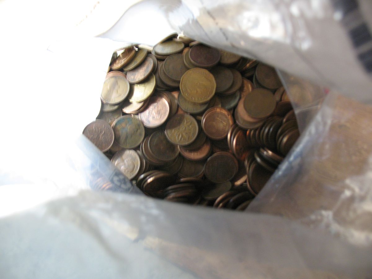 Optimistic-Bank-Bag-Of-Mixed-Canadian-And-USA-Pennies