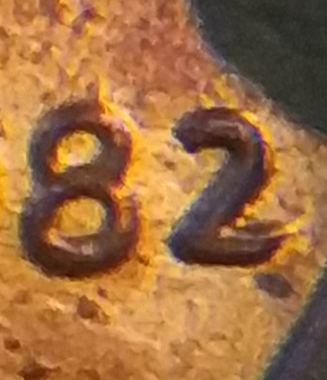 Dark-Scars-&-Blisters-On-Each-Face-Of-The-1982-P-LMC