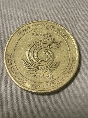 1999-Aust-1$-Coin-With-Stamped-...-4-...near-And-Over-The-Date-?