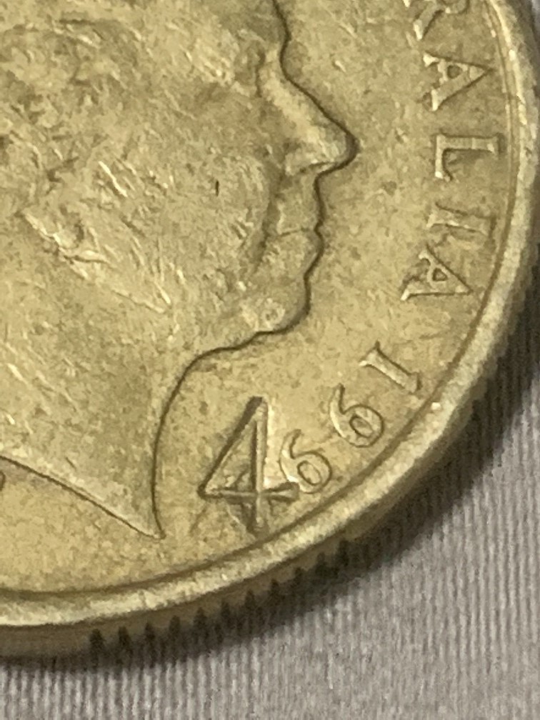 1999-Aust-1$-Coin-With-Stamped-...-4-...near-And-Over-The-Date-?