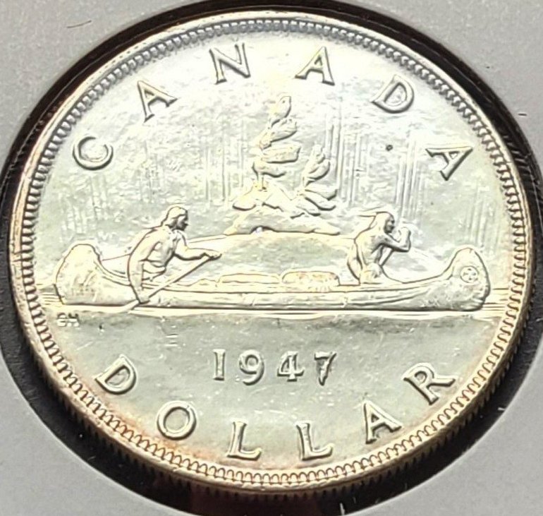 Grading-On-This-1947-Pointed-7-Silver-Dollar