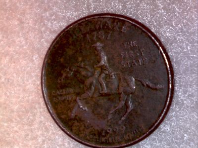 1999-Delaware-Quarter-Error.-Environmental?