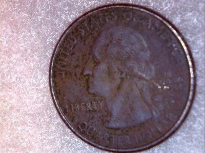 1999-Delaware-Quarter-Error.-Environmental?