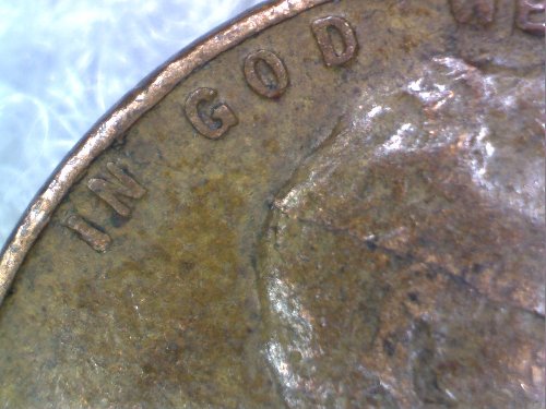 1944-Wheat-Penny,-Line-Across-Obverse.-Lamination-Error?