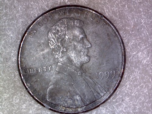 1999-Lincoln-Penny,-Missing-Copper-Layer-On-Obverse-And-Reverse?