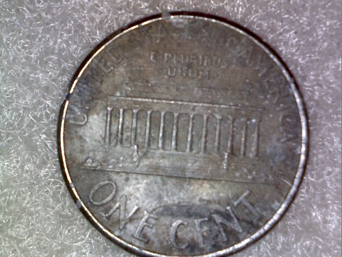 1999-Lincoln-Penny,-Missing-Copper-Layer-On-Obverse-And-Reverse?