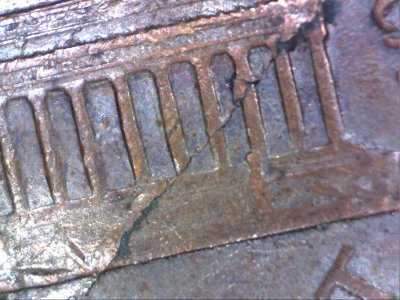 1966-Lincoln-Penny,-Lamination-Error-Across-Obverse-And-?